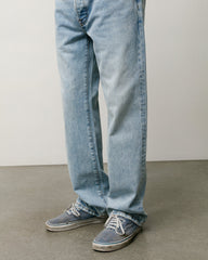 Slim Jean Denim in Light Wash Indigo, unisex straight-cut 100% cotton jeans by Stüssy