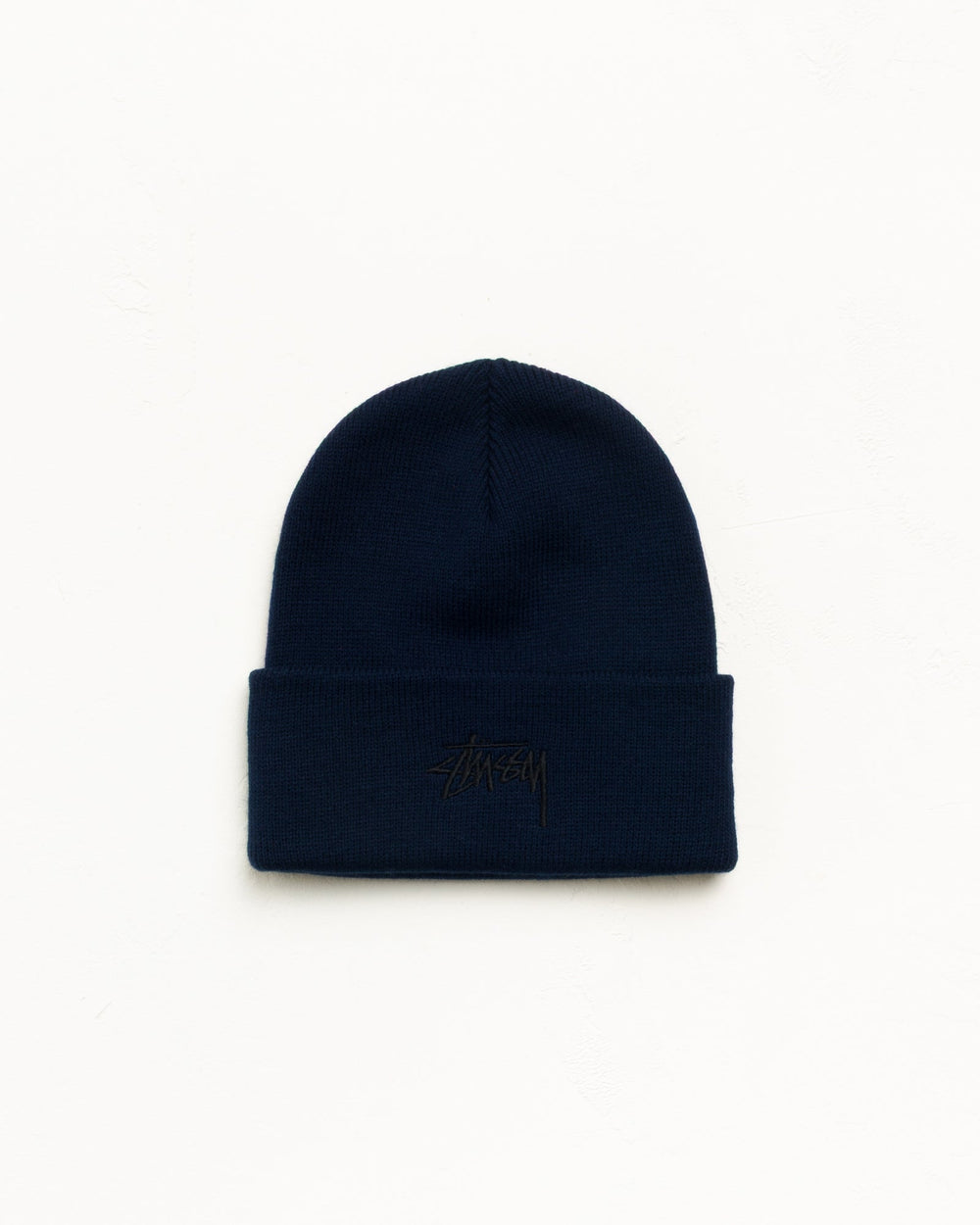 Cuff Beanie Stock Beanie in Eclipse Navy with Stüssy stock logo | hero:main:collection:new-arrivals,shirts,tops-shirts,all,tees,outerwear,denim,knits,accessories,sunglasses,hoodies,sweats,mens-hoodies-sweatshirts,shorts,pants,bottoms,crew-sweats,zip-ups,swim,sweatpants,graphics,lazy-tees,mens-swim,womens-swim,swim,basic-9twenty,button-ups,jerseys,thermals,shorts,trunks,cargos,denim-jeans,bottoms,bags,belts,wearables,gear,footwear,button-ups,basic-tops,jerseys, | product-card-slider