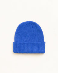 Basic Stüssy Cuff Beanie headwear in True Blue, ribbed knit unisex style | product-card-slider