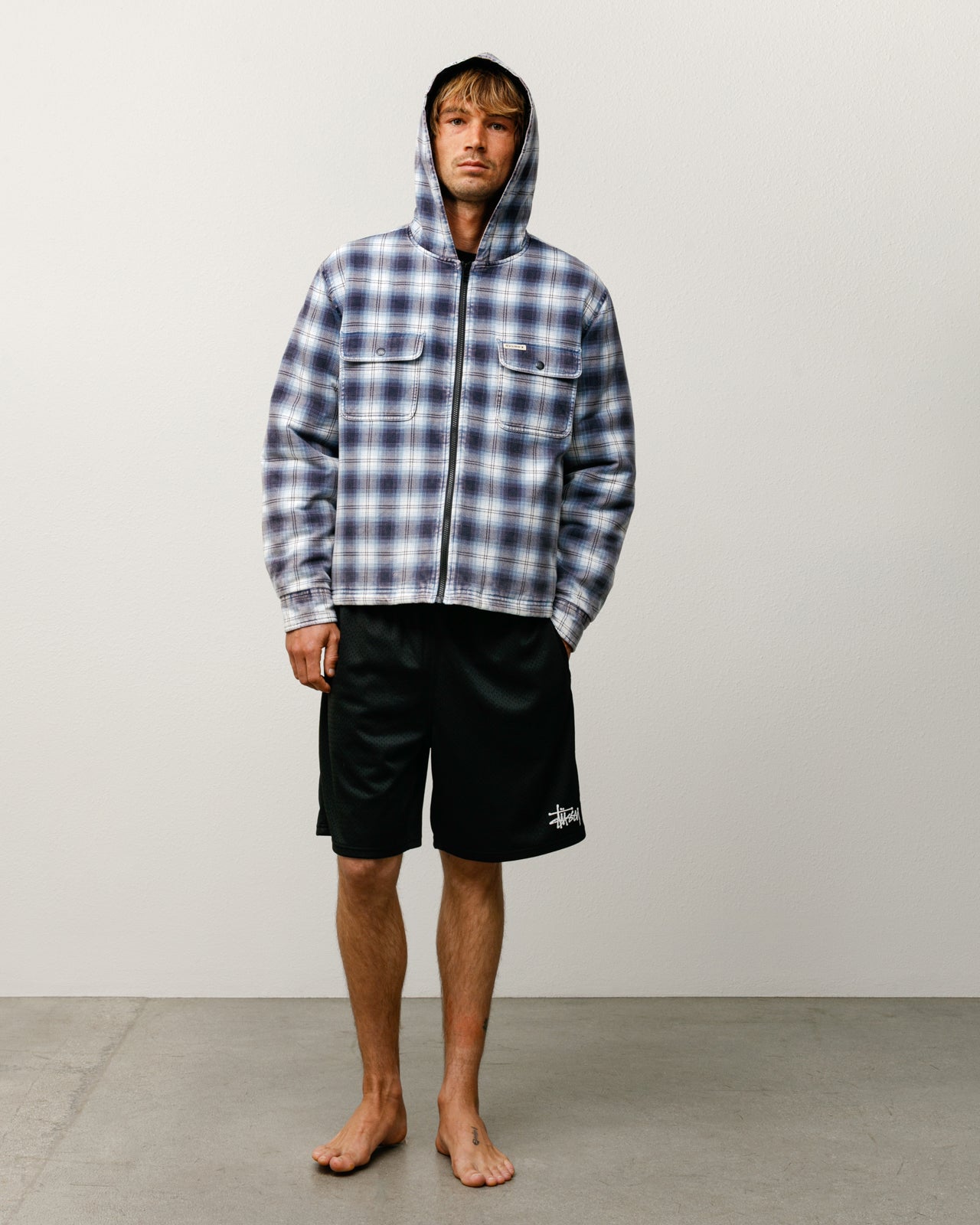 Stüssy Basic Mesh Short shorts in black mesh with left‑leg logo detailing | product-card-slider