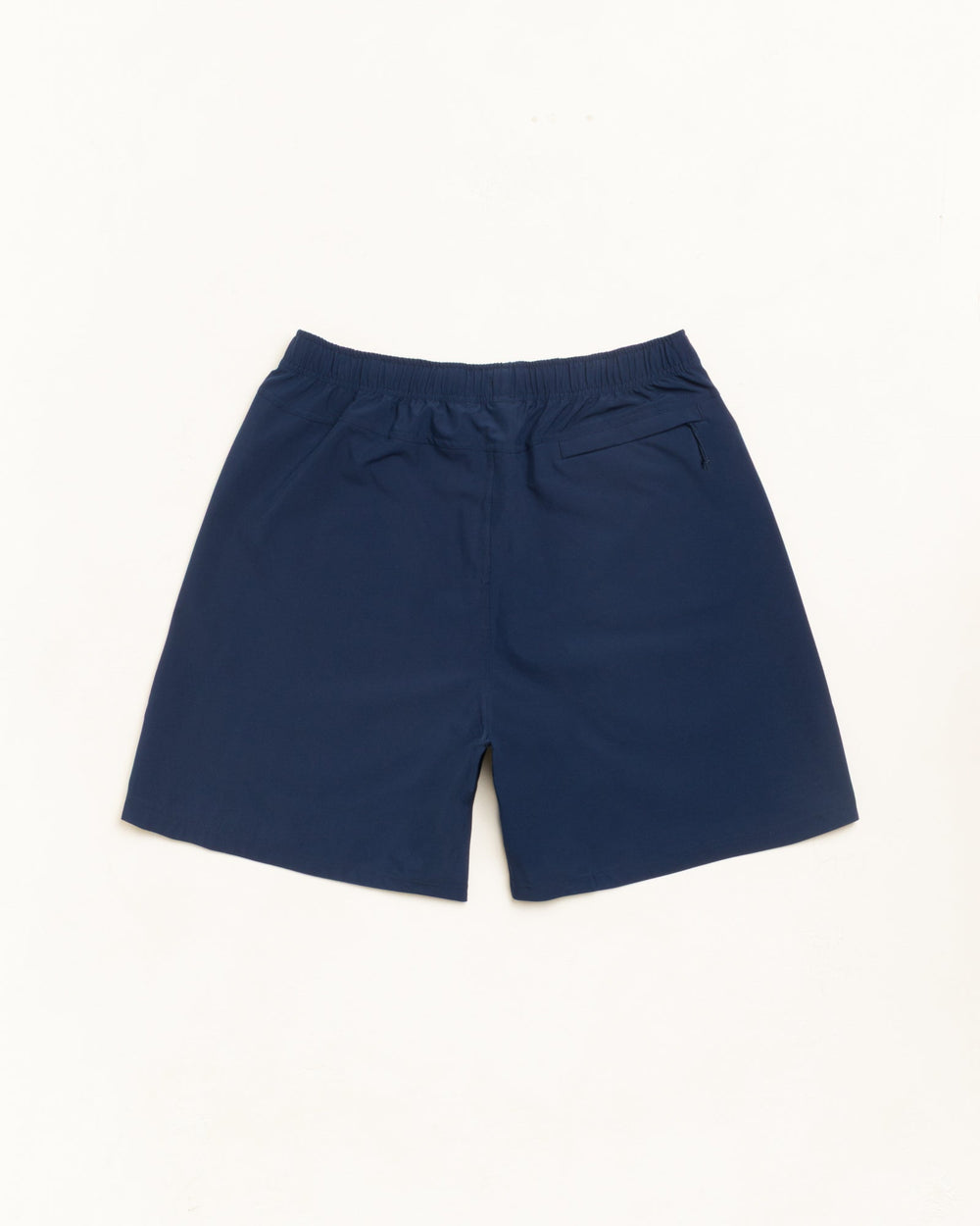 Sport Short shorts in navy with elastic waist and back welt zip pocket, unisex