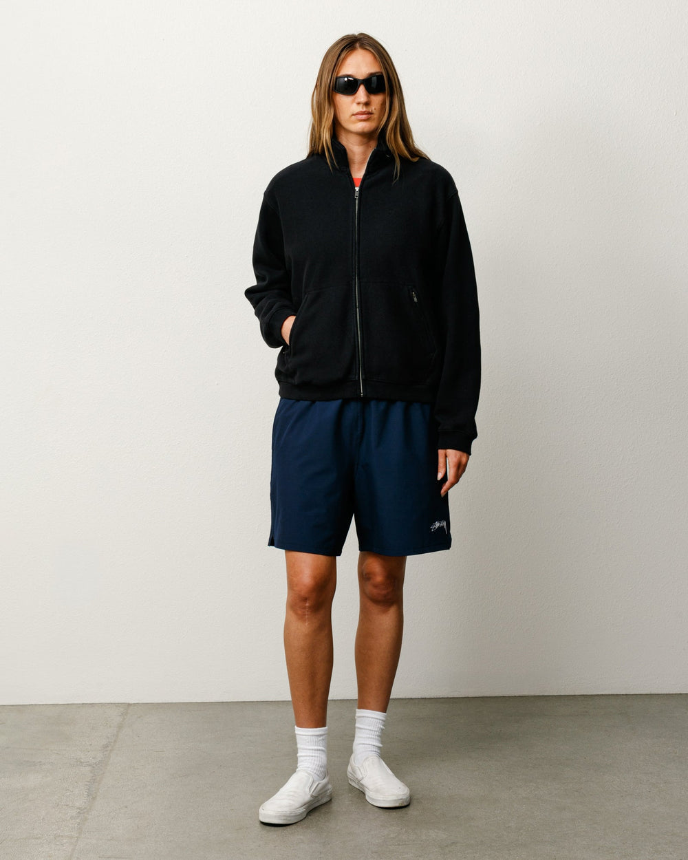 Sport Short unisex shorts in navy performance fabric with Stüssy logo at left leg