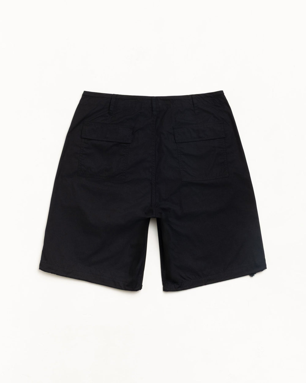 Surplus Short in Black, back view with dual flap pockets; flat lay on white