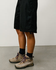 Surplus Short Unisex Regular in Black, knee-length with Stüssy logo embroidery at hem