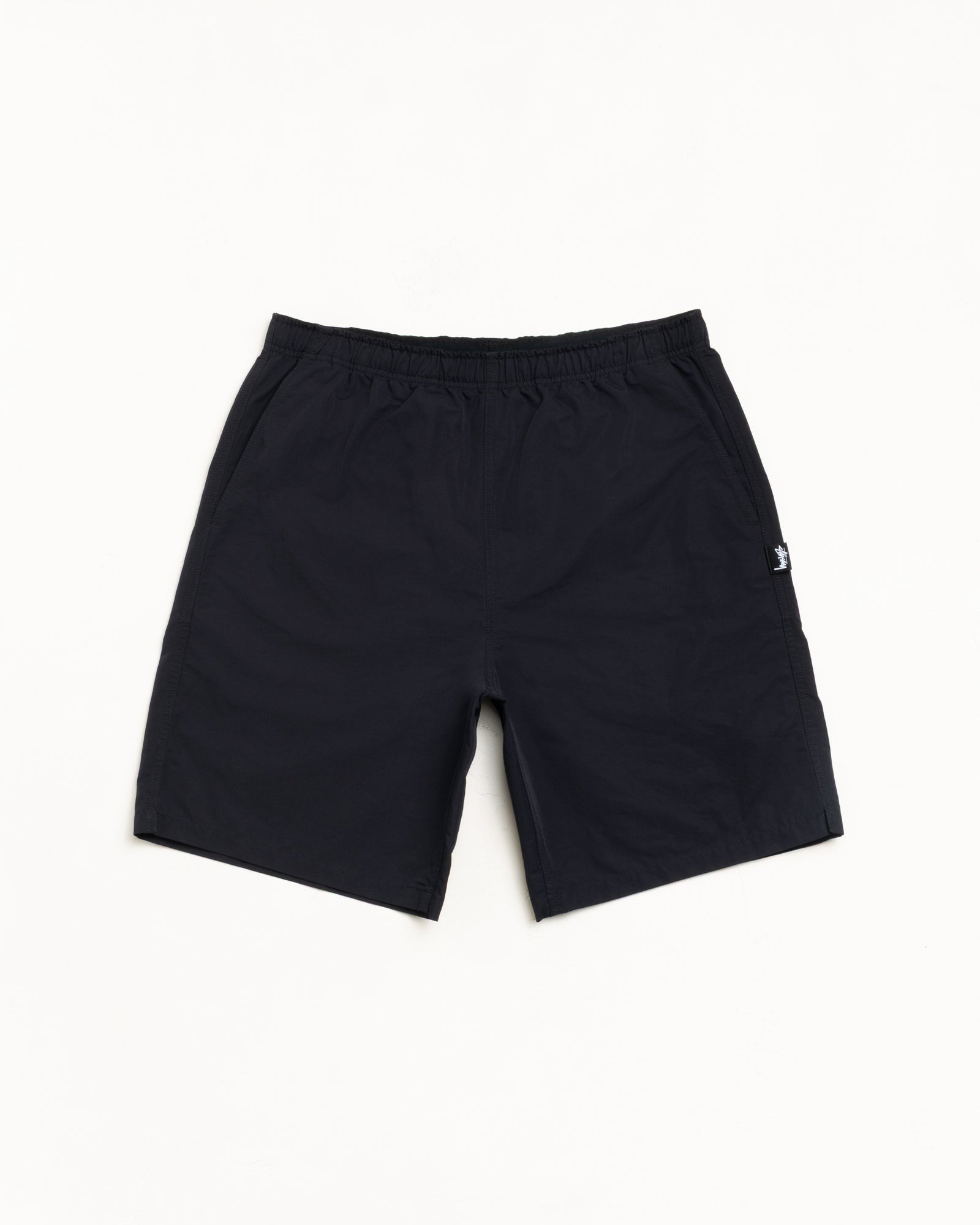 Transit Short unisex shorts in black by Stüssy | hero:main:collection:new-arrivals,shirts,tops-shirts,all,tees,outerwear,denim,knits,accessories,sunglasses,hoodies,sweats,mens-hoodies-sweatshirts,shorts,pants,bottoms,crew-sweats,zip-ups,swim,sweatpants,graphics,lazy-tees,mens-swim,womens-swim,swim,basic-9twenty,button-ups,jerseys,thermals,shorts,trunks,cargos,denim-jeans,bottoms,bags,belts,wearables,gear,footwear,button-ups,basic-tops,jerseys, | product-card-slider