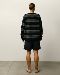 Stock Water Short shorts in black nylon with elastic waist and Stüssy logo at left leg
