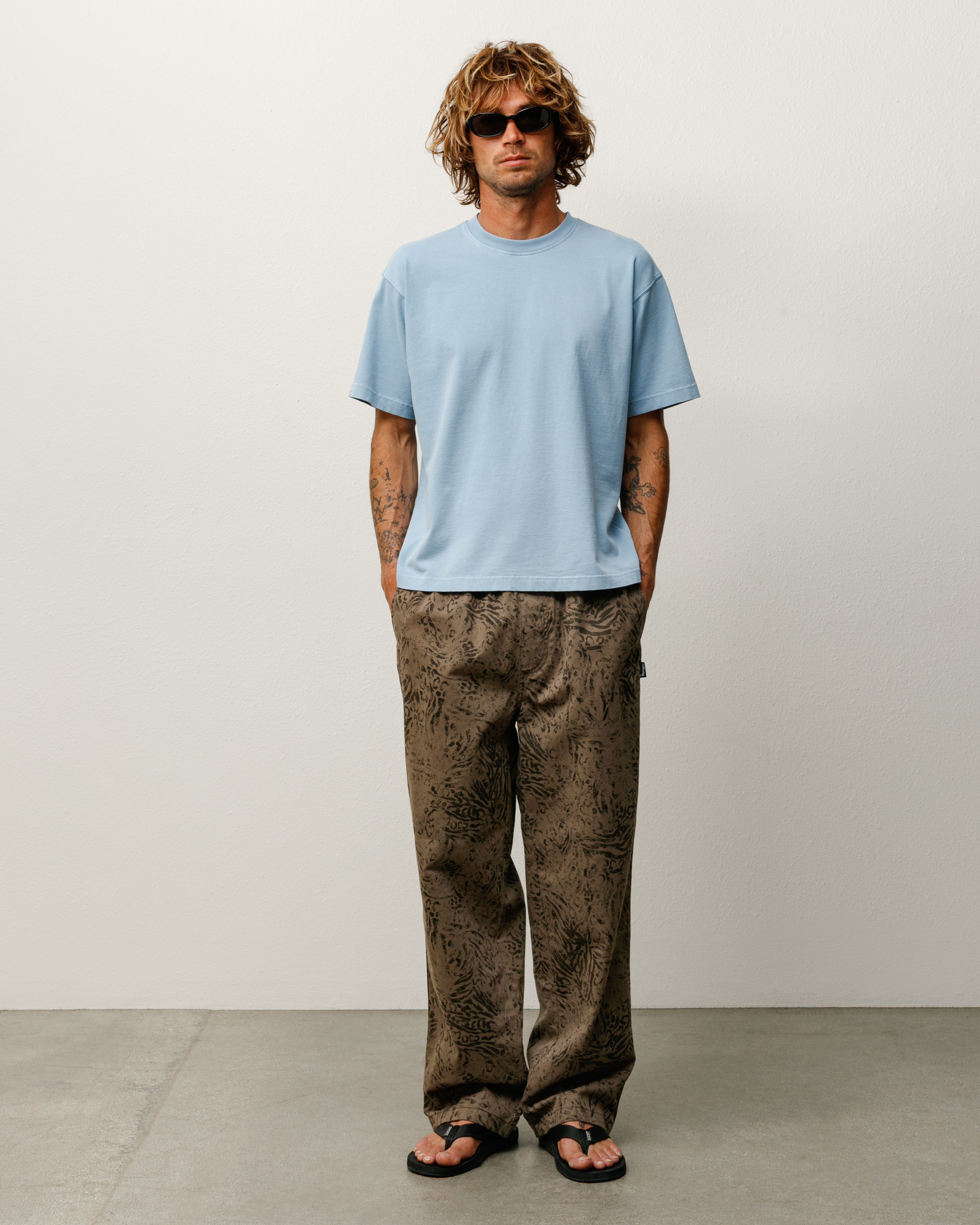 Stüssy Garment Dyed SS Tee, relaxed short-sleeve midweight cotton in the color Dust Blue