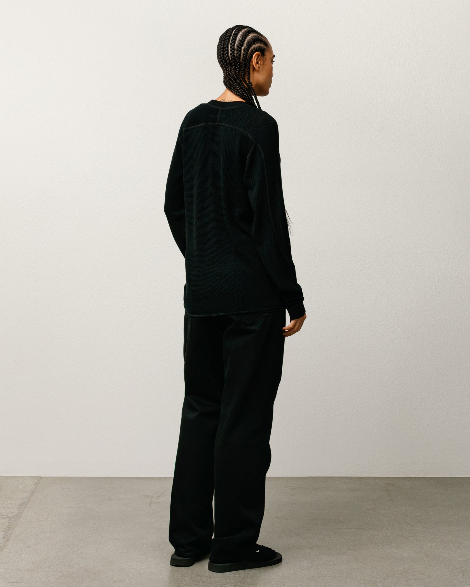 Wool LS Thermal knit in black; waffle-knit wool crewneck long sleeve by Stüssy.