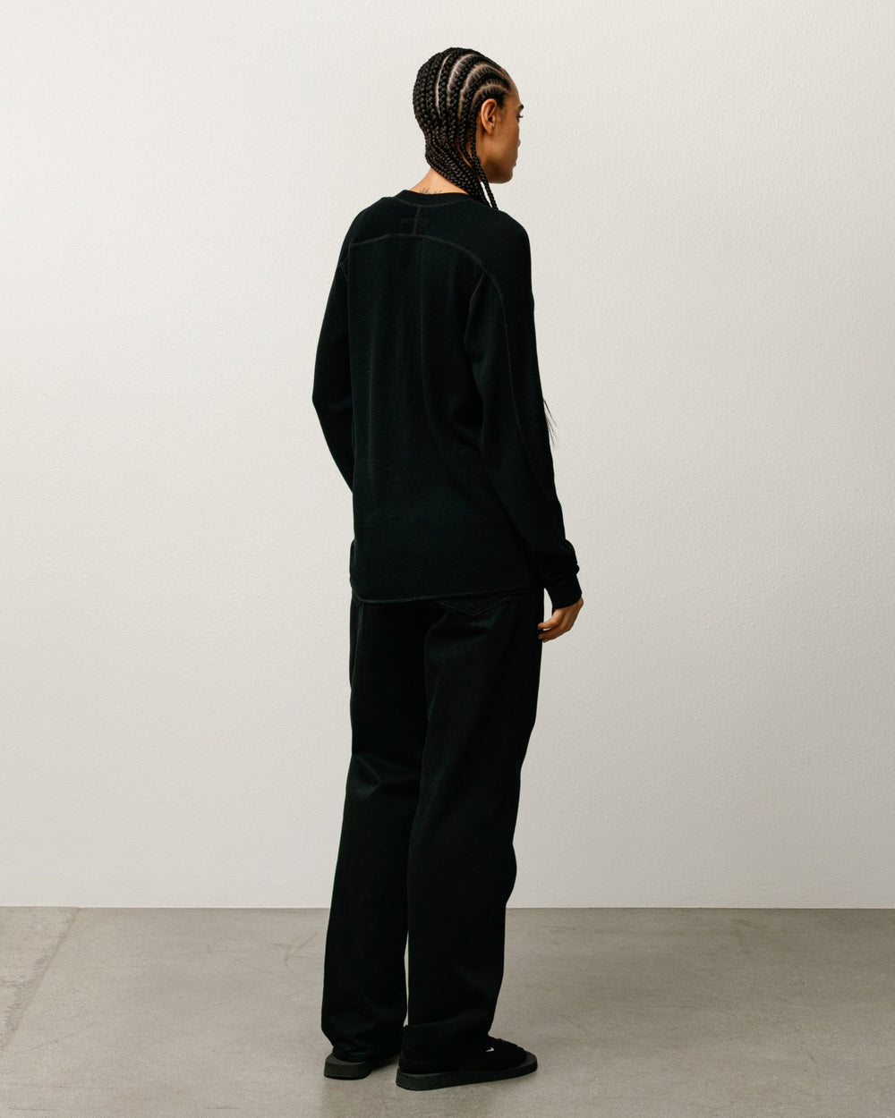 Wool LS Thermal knit in black; waffle-knit wool crewneck long sleeve by Stüssy.
