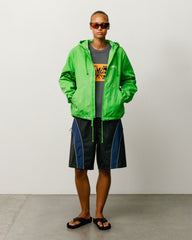 Waxed Cotton Beach Shell jacket in Kiwi green with hood, zip front, and Stüssy chest logo