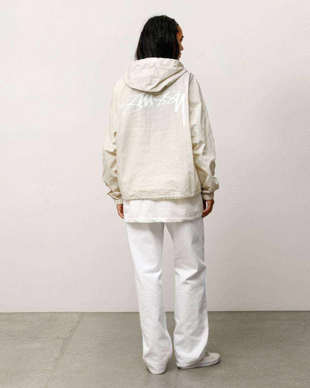 Stüssy Waxed Cotton Beach Shell unisex jacket in Stone with hood and back logo