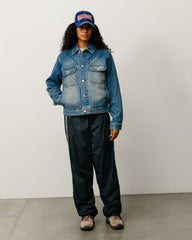 Denim Trucker Jacket in the color Dark Wash Indigo