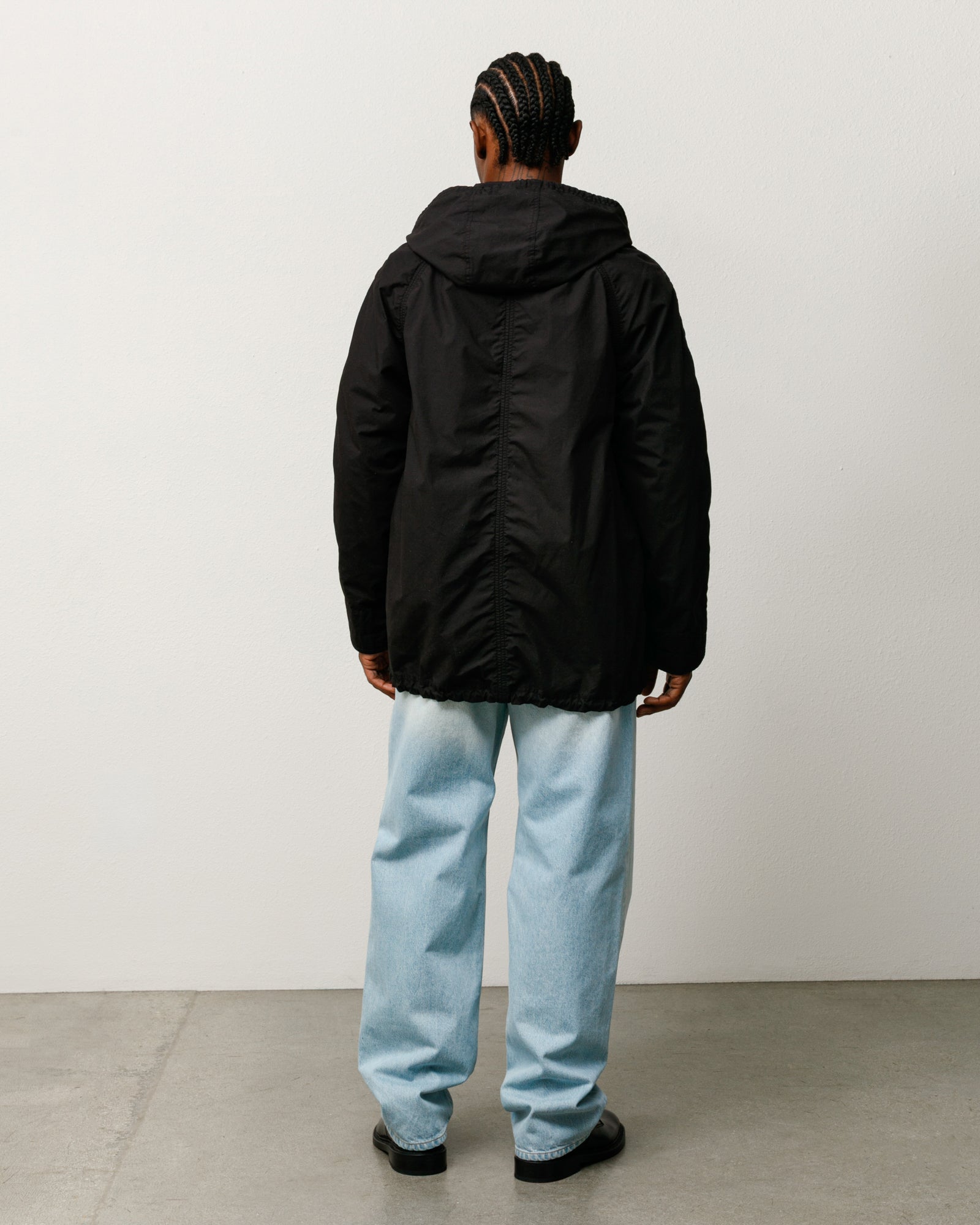Stüssy lightweight long coat, unisex long-sleeve, in black.