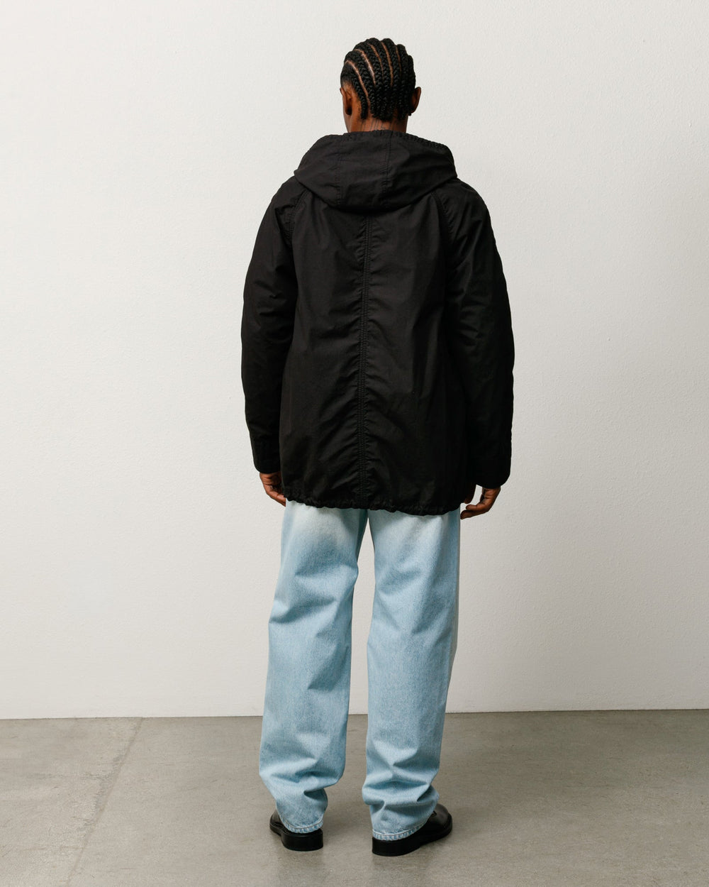 Stüssy lightweight long coat, unisex long-sleeve, in black.