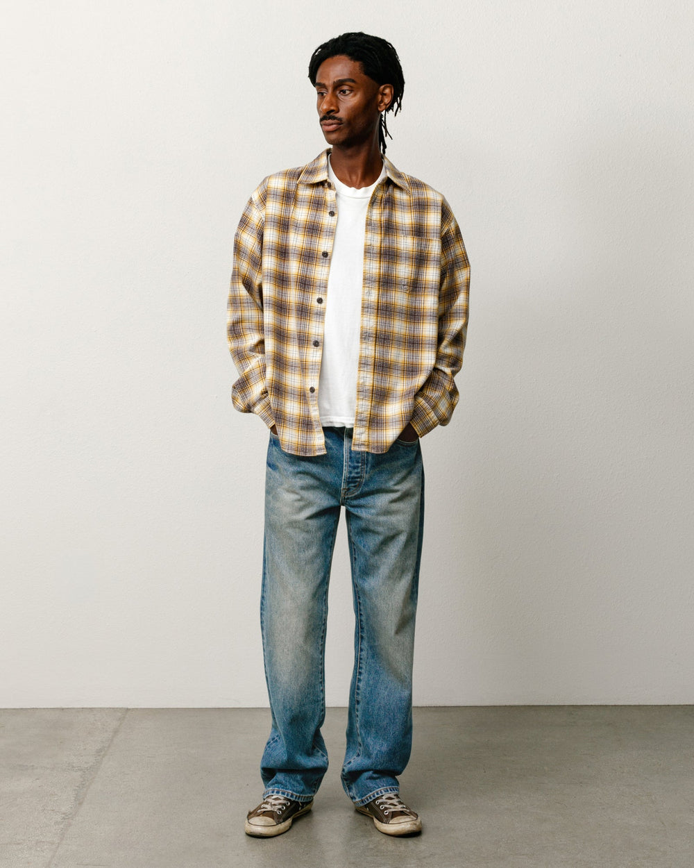 Unisex straight denim jeans in dark wash indigo, relaxed leg silhouette | product-card-slider