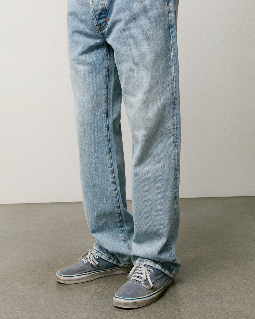 Slim Jean Denim in Light Wash Indigo, unisex straight-cut 100% cotton jeans by Stüssy