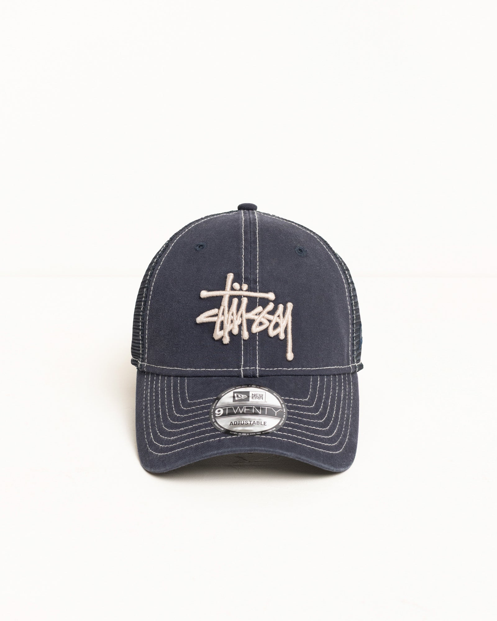 Stüssy 9TWENTY Washed Basic Trucker unisex cap in Navy | hero:main:collection:new-arrivals,shirts,tops-shirts,all,tees,outerwear,denim,knits,accessories,sunglasses,hoodies,sweats,mens-hoodies-sweatshirts,shorts,pants,bottoms,crew-sweats,zip-ups,swim,sweatpants,graphics,lazy-tees,mens-swim,womens-swim,swim,basic-9twenty,button-ups,jerseys,thermals,shorts,trunks,cargos,denim-jeans,bottoms,bags,belts,wearables,gear,footwear,button-ups,basic-tops,jerseys, | product-card-slider