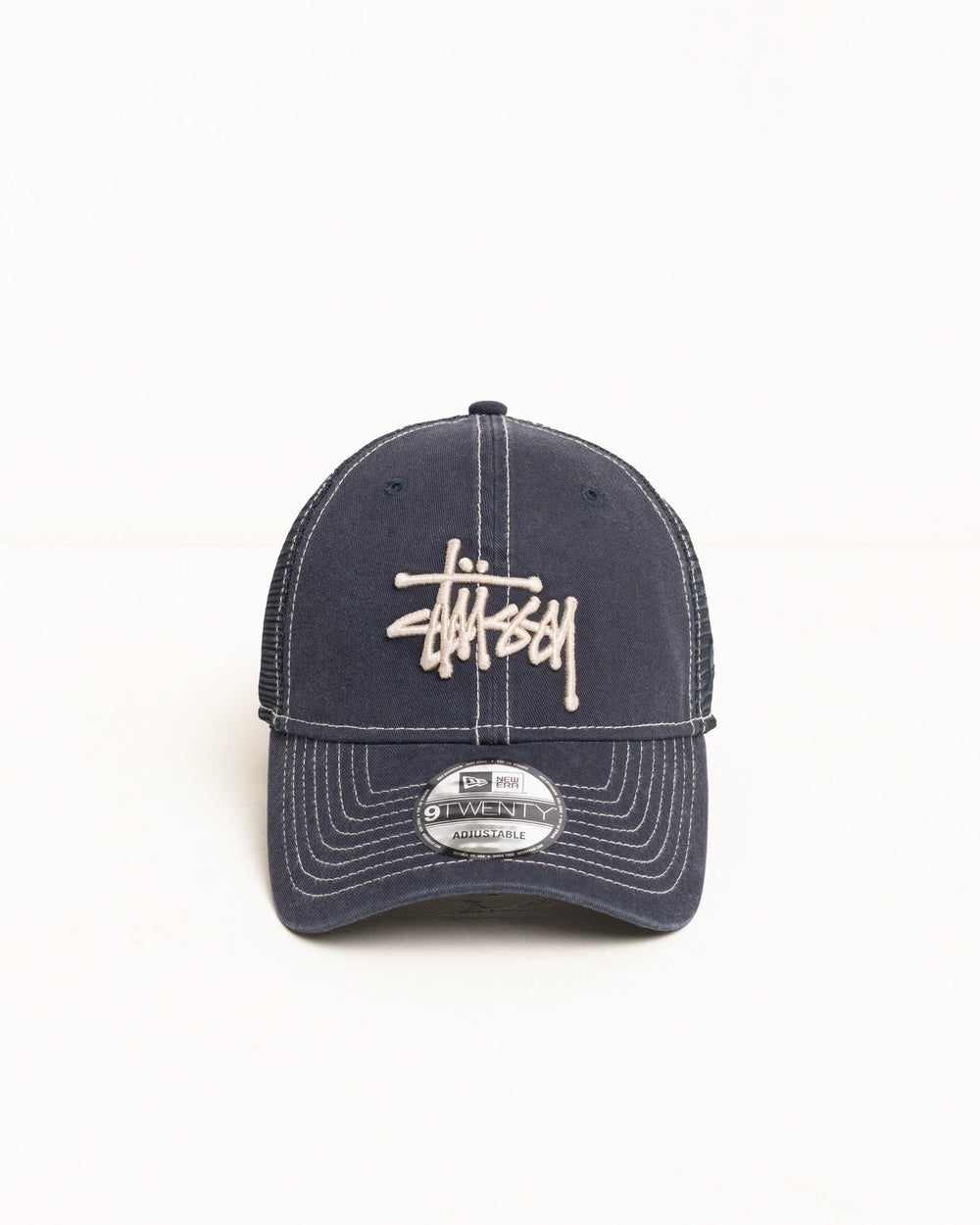 Stüssy 9TWENTY Washed Basic Trucker unisex cap in Navy | hero:main:collection:new-arrivals,shirts,tops-shirts,all,tees,outerwear,denim,knits,accessories,sunglasses,hoodies,sweats,mens-hoodies-sweatshirts,shorts,pants,bottoms,crew-sweats,zip-ups,swim,sweatpants,graphics,lazy-tees,mens-swim,womens-swim,swim,basic-9twenty,button-ups,jerseys,thermals,shorts,trunks,cargos,denim-jeans,bottoms,bags,belts,wearables,gear,footwear,button-ups,basic-tops,jerseys, | product-card-slider