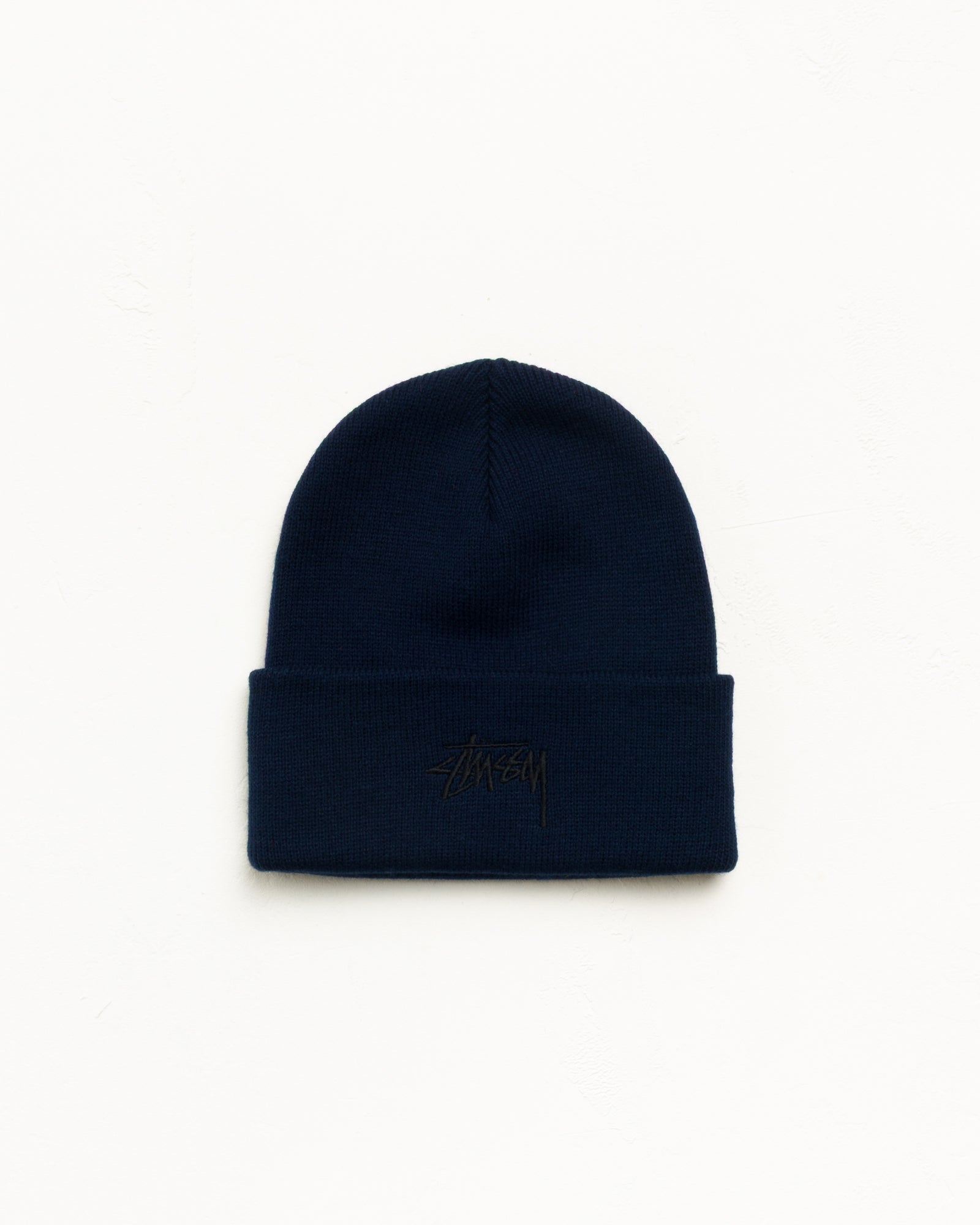 Cuff Beanie Stock Beanie in Eclipse Navy with Stüssy stock logo | hero:main:collection:new-arrivals,shirts,tops-shirts,all,tees,outerwear,denim,knits,accessories,sunglasses,hoodies,sweats,mens-hoodies-sweatshirts,shorts,pants,bottoms,crew-sweats,zip-ups,swim,sweatpants,graphics,lazy-tees,mens-swim,womens-swim,swim,basic-9twenty,button-ups,jerseys,thermals,shorts,trunks,cargos,denim-jeans,bottoms,bags,belts,wearables,gear,footwear,button-ups,basic-tops,jerseys, | product-card-slider