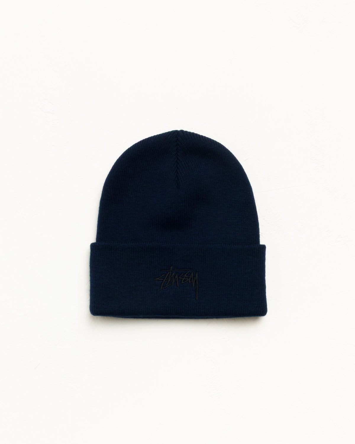 Cuff Beanie Stock Beanie in Eclipse Navy with Stüssy stock logo | hero:main:collection:new-arrivals,shirts,tops-shirts,all,tees,outerwear,denim,knits,accessories,sunglasses,hoodies,sweats,mens-hoodies-sweatshirts,shorts,pants,bottoms,crew-sweats,zip-ups,swim,sweatpants,graphics,lazy-tees,mens-swim,womens-swim,swim,basic-9twenty,button-ups,jerseys,thermals,shorts,trunks,cargos,denim-jeans,bottoms,bags,belts,wearables,gear,footwear,button-ups,basic-tops,jerseys, | product-card-slider