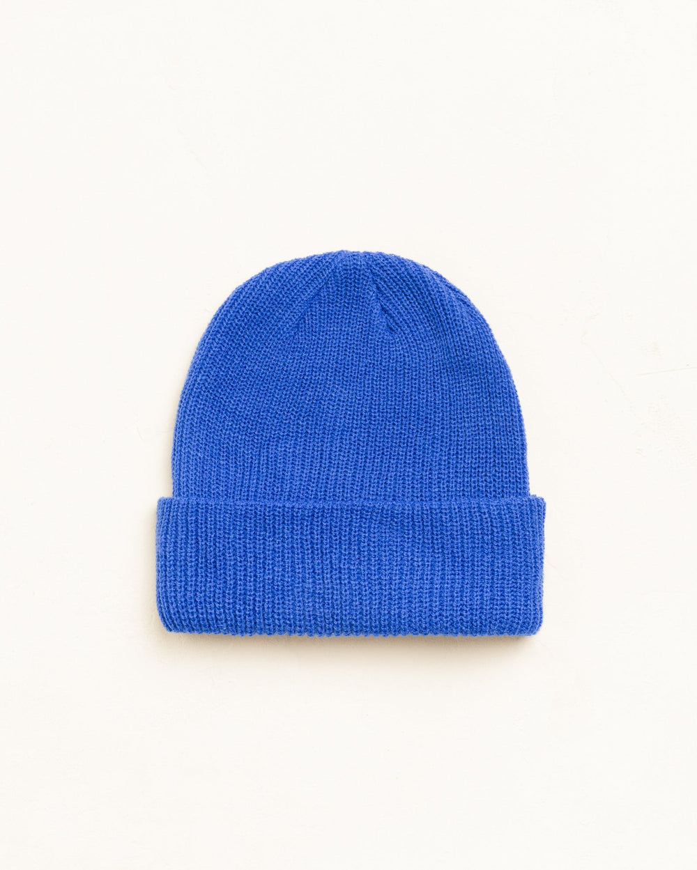 Basic Stüssy Cuff Beanie headwear in True Blue, ribbed knit unisex style | product-card-slider
