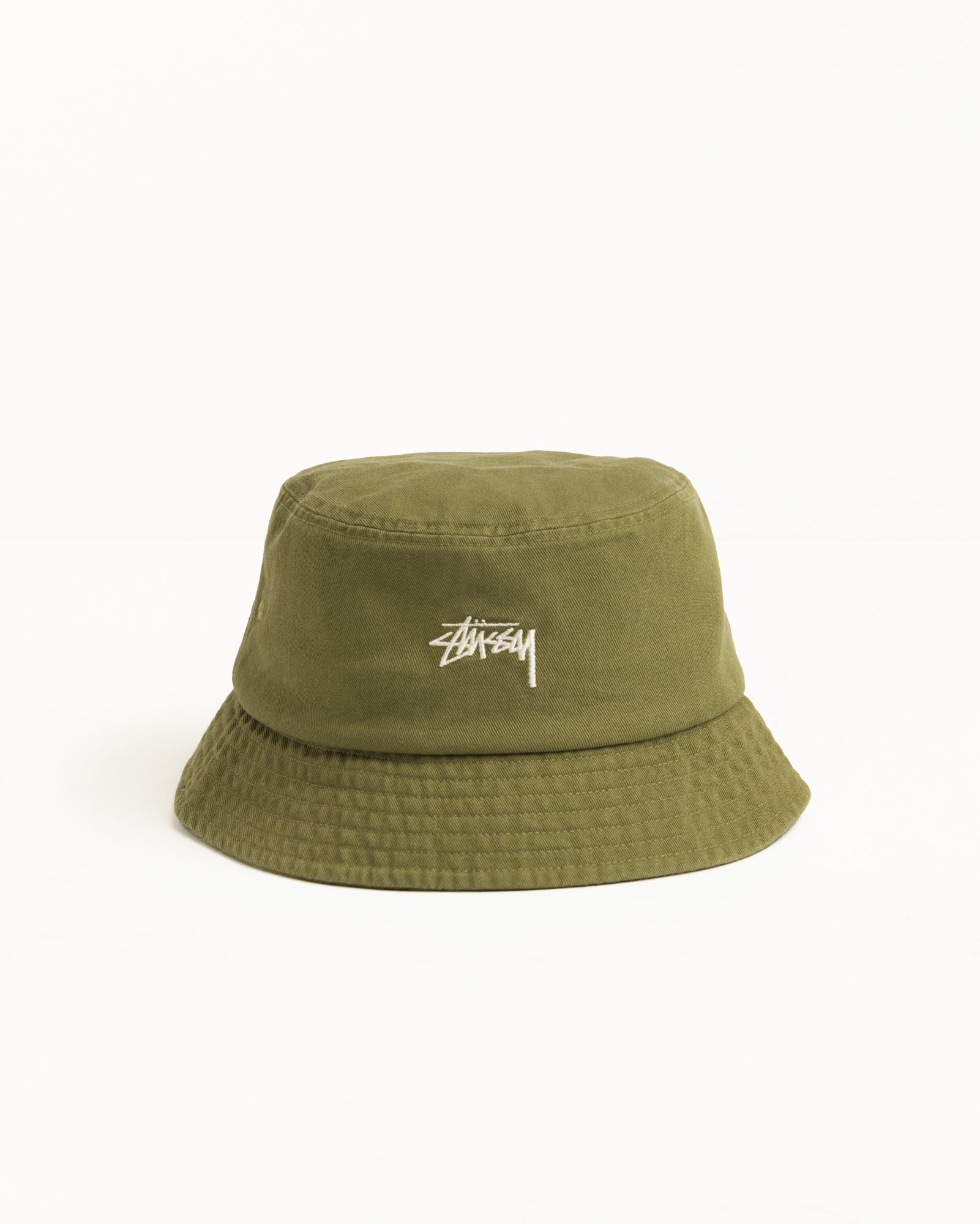 Stock Bucket Hat Headwear in the color Olive | hero:main:collection:new-arrivals,shirts,tops-shirts,all,tees,outerwear,denim,knits,accessories,sunglasses,hoodies,sweats,mens-hoodies-sweatshirts,shorts,pants,bottoms,crew-sweats,zip-ups,swim,sweatpants,graphics,lazy-tees,mens-swim,womens-swim,swim,basic-9twenty,button-ups,jerseys,thermals,shorts,trunks,cargos,denim-jeans,bottoms,bags,belts,wearables,gear,footwear,button-ups,basic-tops,jerseys, | product-card-slider
