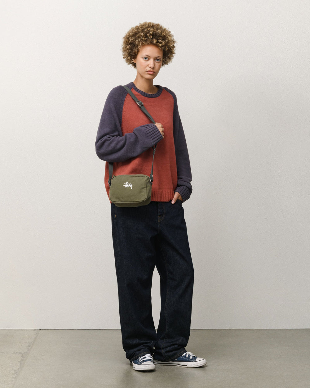 Stüssy CANVAS POUCH accessories in green cotton canvas with adjustable crossbody strap and logo. | product-card-slider