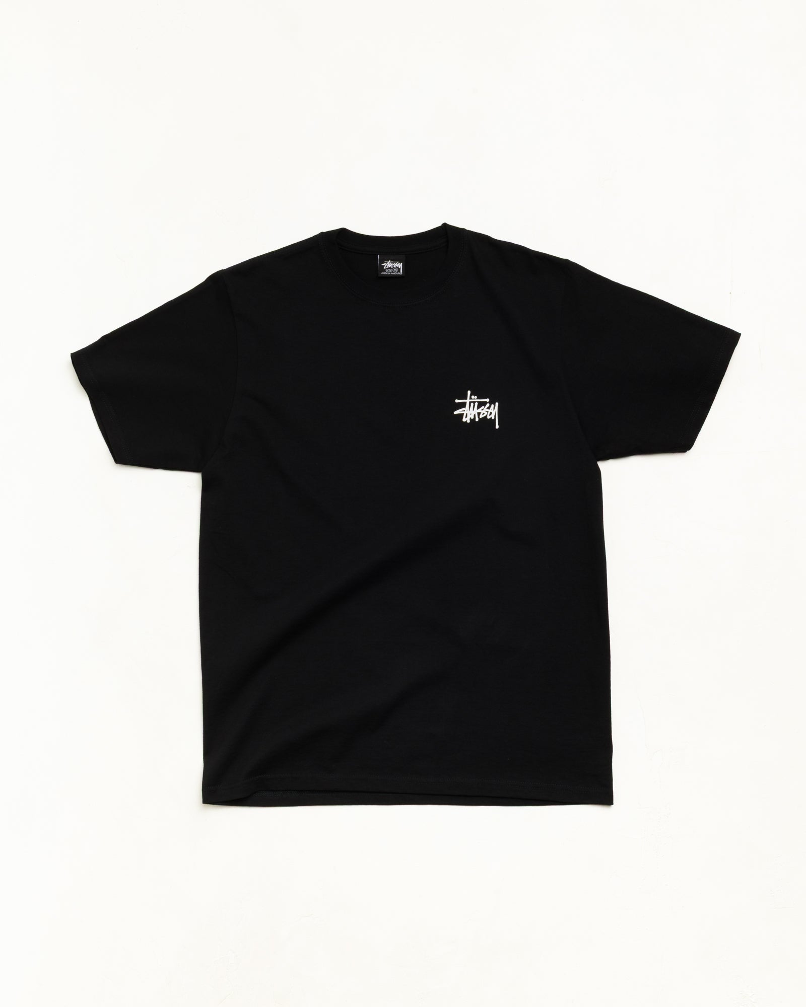 Basic Stüssy Tee unisex short-sleeve cotton in black | product-card-slider