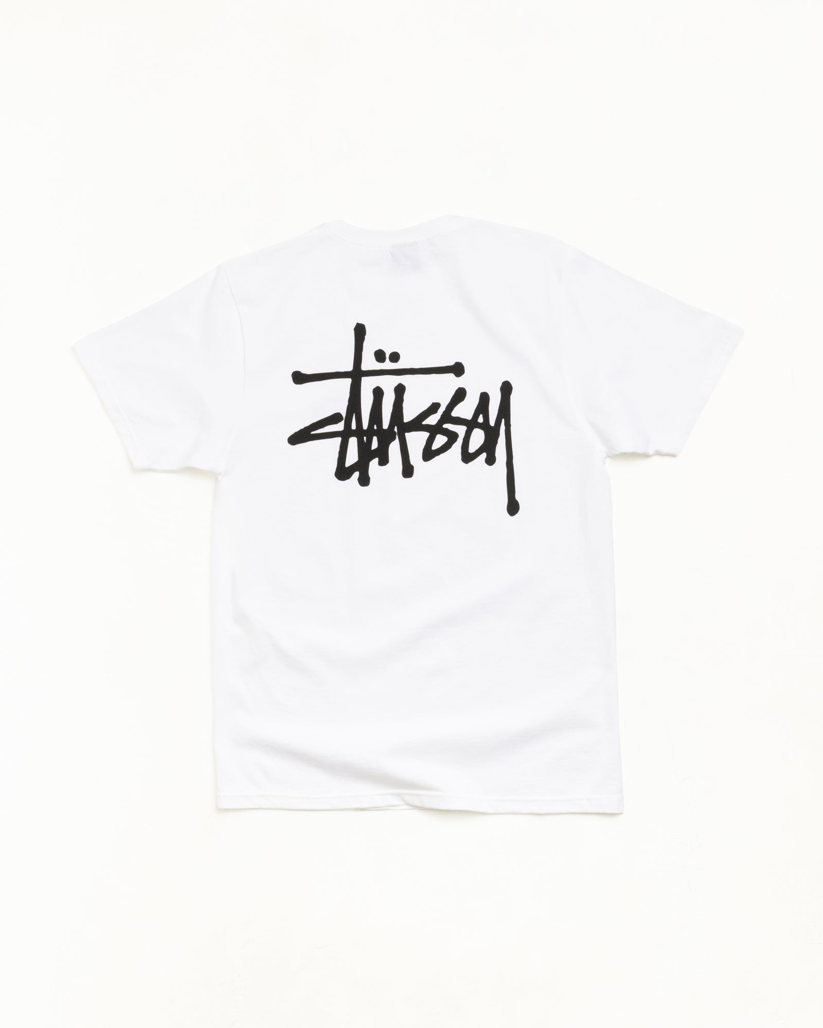 Basic Stüssy Cotton Tee Unisex Short Sleeve in White | hero:main:collection:new-arrivals,shirts,tops-shirts,all,tees,outerwear,denim,crew-sweats,knits,accessories,sunglasses,hoodies,sweats,mens-hoodies-sweatshirts,shorts,pants,bottoms,basic-stussy-sweats,basic-stussy-tees, | product-card-slider