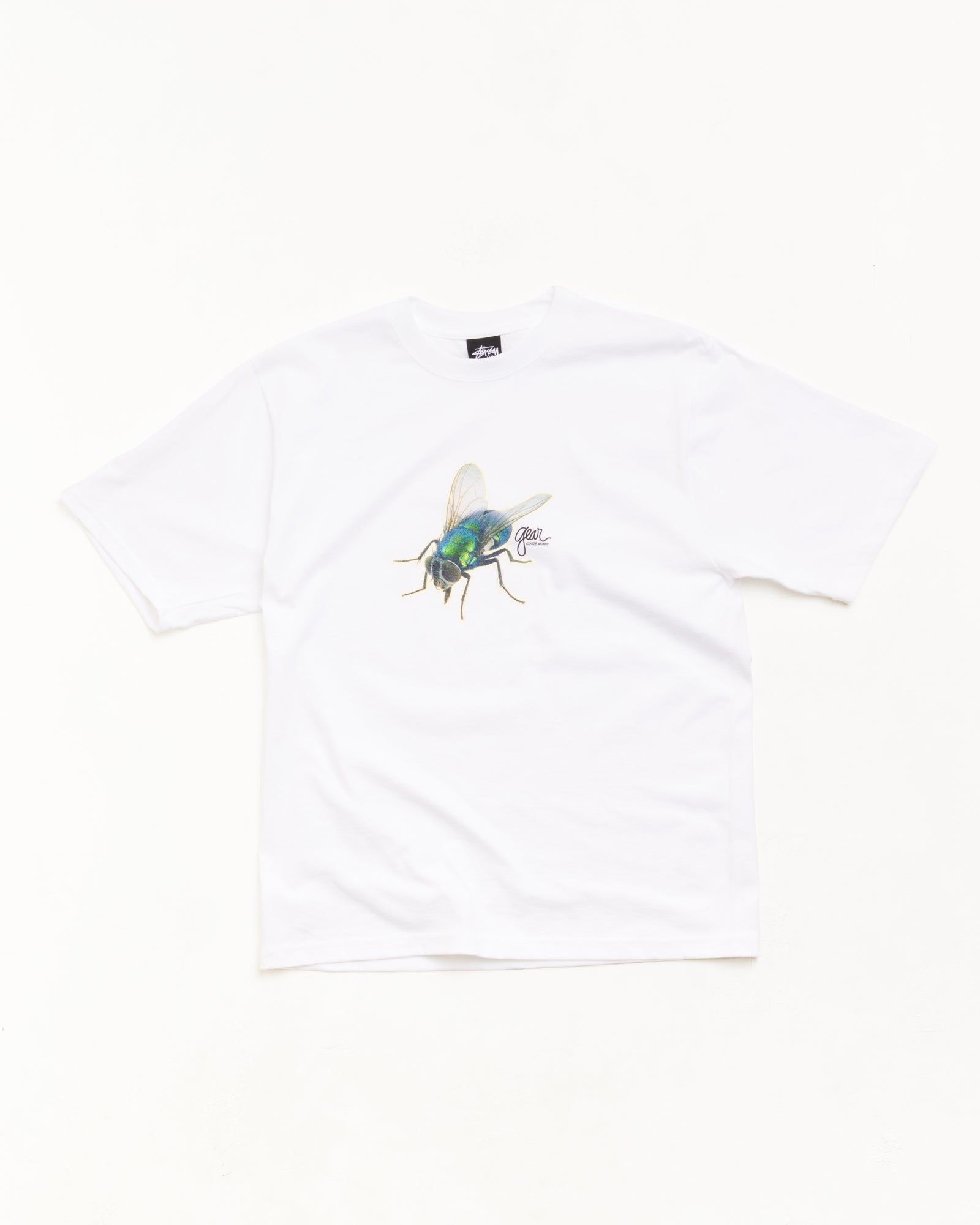 Fly Gear Tee Unisex Short Sleeve In White | hero:main:collection:new-arrivals,shirts,tops-shirts,all,tees,outerwear,denim,knits,accessories,sunglasses,hoodies,sweats,mens-hoodies-sweatshirts,shorts,pants,bottoms,crew-sweats,zip-ups,swim,sweatpants,graphics,lazy-tees,mens-swim,womens-swim,swim,basic-9twenty,button-ups,jerseys,thermals,shorts,trunks,cargos,denim-jeans,bottoms,bags,belts,wearables,gear,footwear,button-ups,basic-tops,jerseys, | product-card-slider